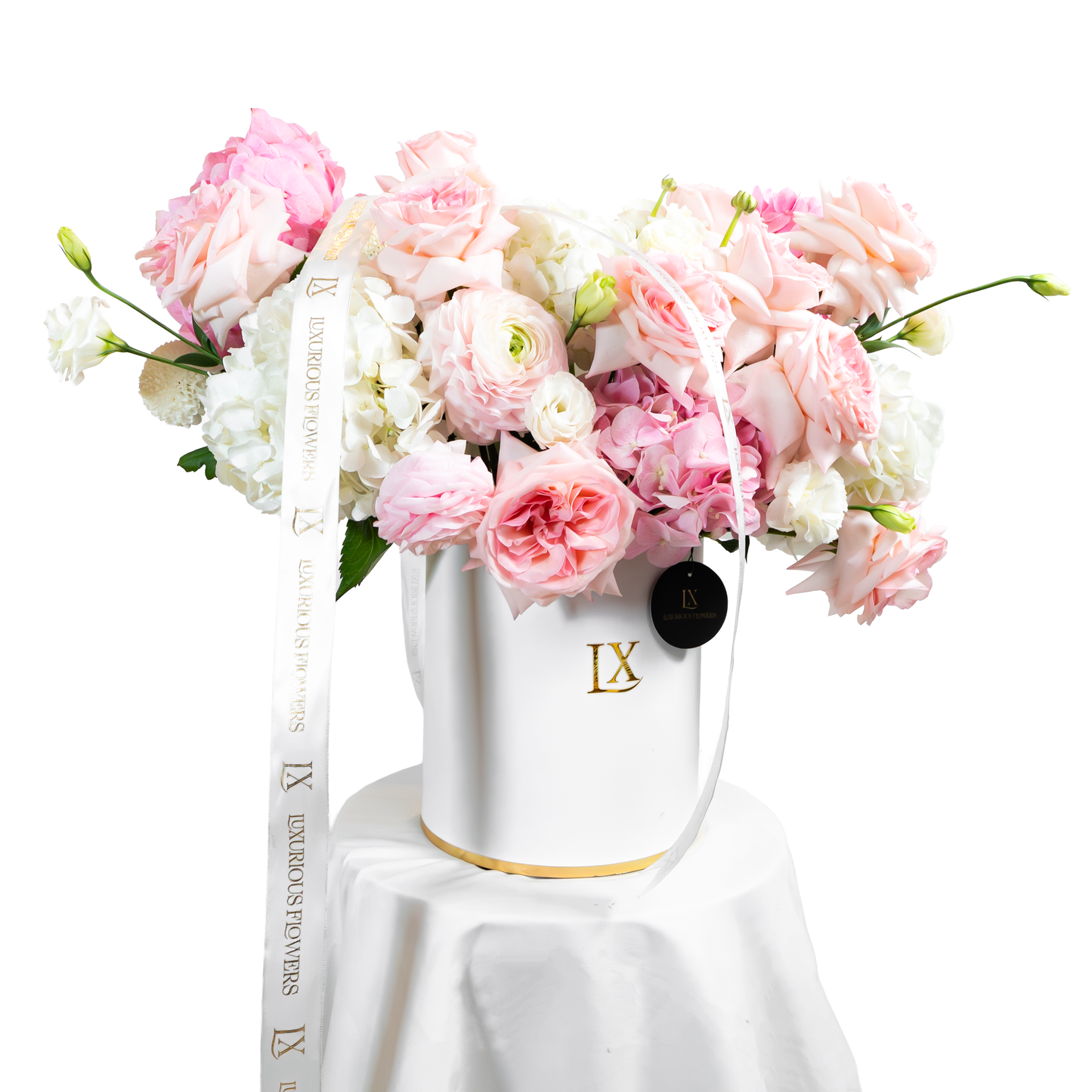 Luxury flower arrangement in a white LX box with pink and white roses, perfect for elegant Dubai floral gifts.