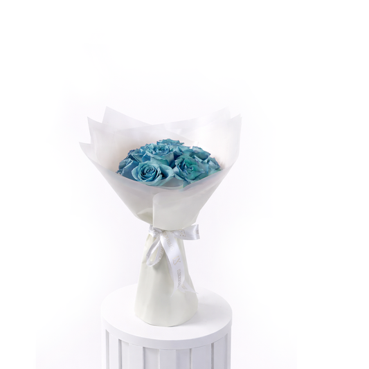 12 blue roses bouquet wrapped in white luxury paper