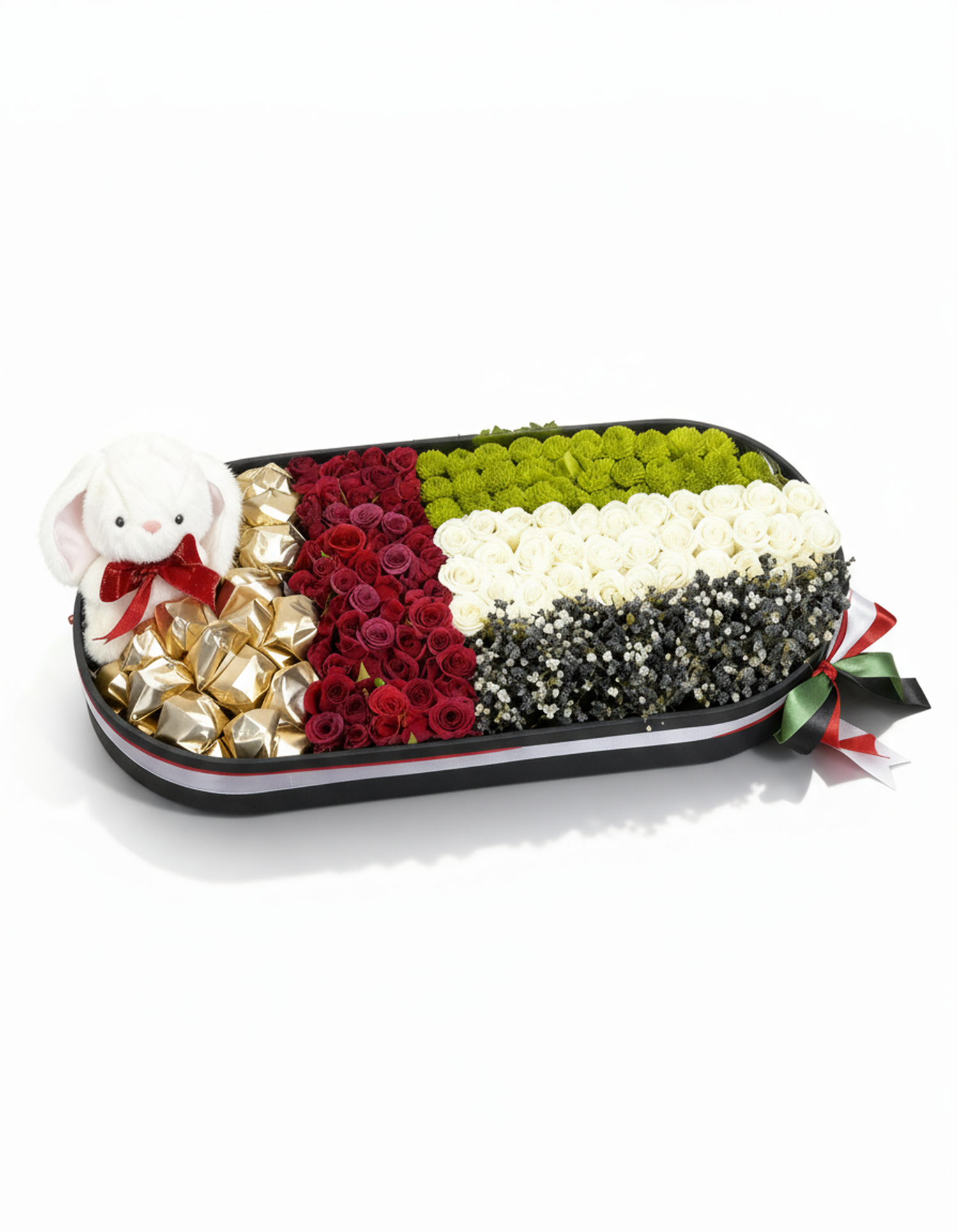 A modern arrangement featuring UAE flag-inspired flowers and artisanal chocolates for a classy and festive touch.