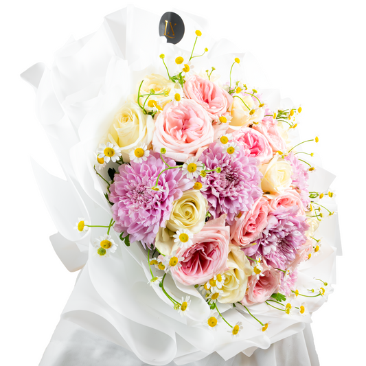 Bouquet of pink and white flowers with a white wrap for sale in dubai perfect gift flower