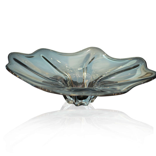 Clear glass vase with wavy design on a white background for sale in dubai online