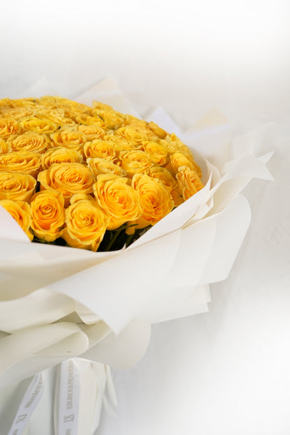 Close-up detail of vibrant mandarin orange flower petals for luxury gift