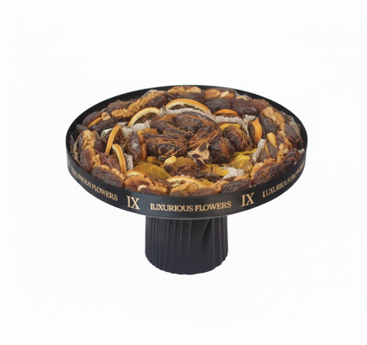 Luxury assorted dry fruits and dates platter in elegant black tray – premium gift hamper Dubai