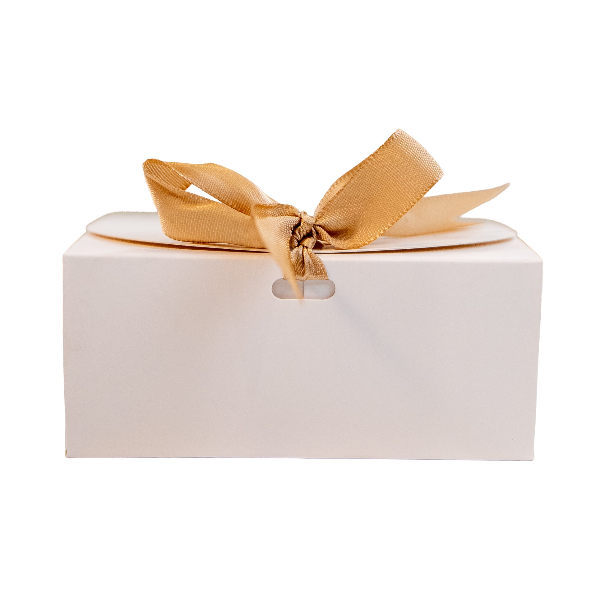 White gift box with a gold ribbon on a white background