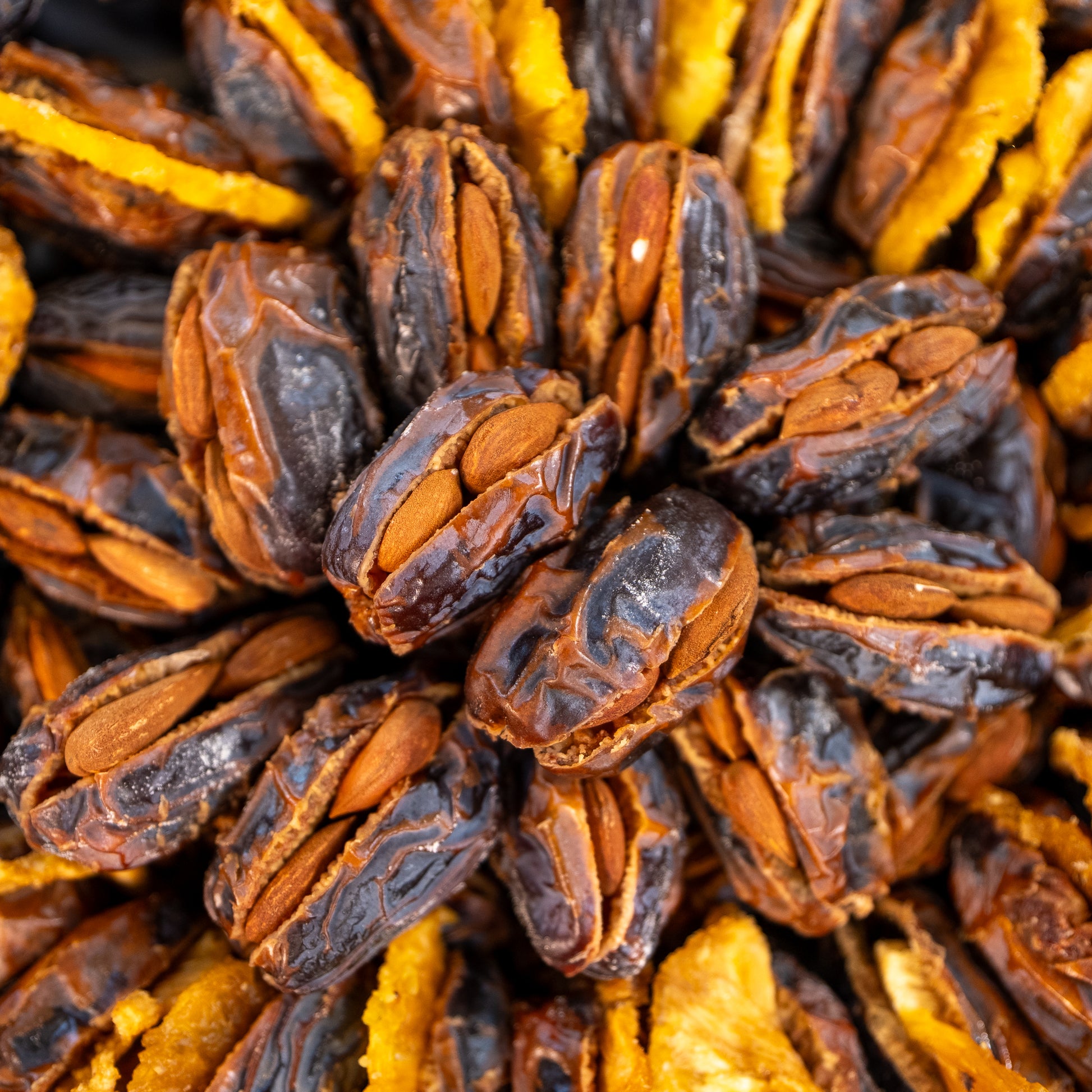 close-up photograph of stuffed dates with almonds.