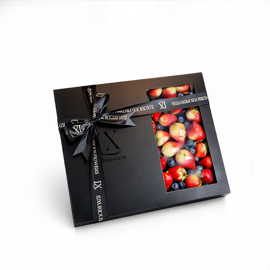 Luxury black gift box with fresh strawberries, blueberries, and premium ramadan gift for delivery in Dubai