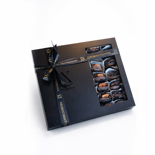 Luxury chocolate stuffed dates gift box with walnuts in premium black Ramadan packaging