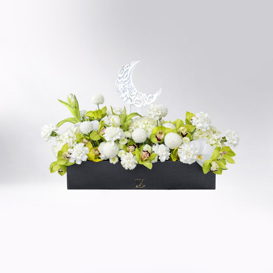 Luxury Ramadan green and white flower arrangement in black box with crescent moon decoration by Luxurious Flowers Dubai